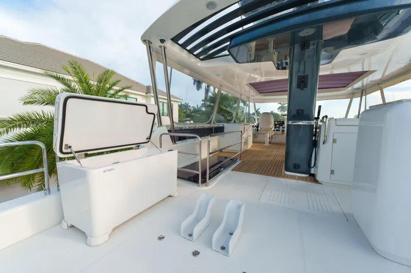Fantasea Yacht Photos Pics Luxurious 2020 Sirena 64 yacht deck with open storage and modern seating area.