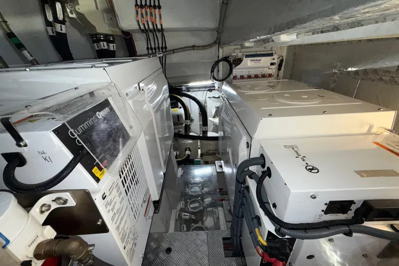 Fantasea Yacht Photos Pics Engine room of 2020 Sirena 64 yacht with Cummins Onan generator and equipment.