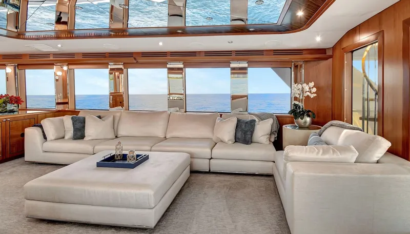 Danielle Yacht Photos Pics Luxurious interior of 2005 Hatteras Semi-Displacement yacht with elegant seating and ocean view.