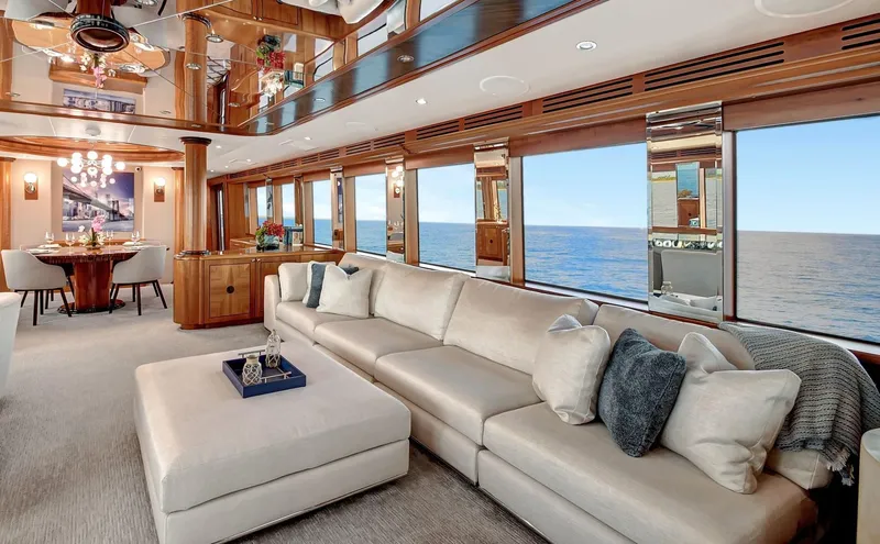 Danielle Yacht Photos Pics Luxurious interior of 2005 Hatteras Semi-Displacement yacht with ocean view and elegant furnishings.
