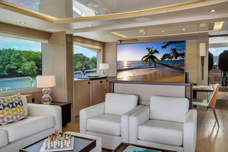  Yacht Photos Pics Luxurious Sunseeker 86 yacht interior, featuring elegant seating and large windows, 2019 model.