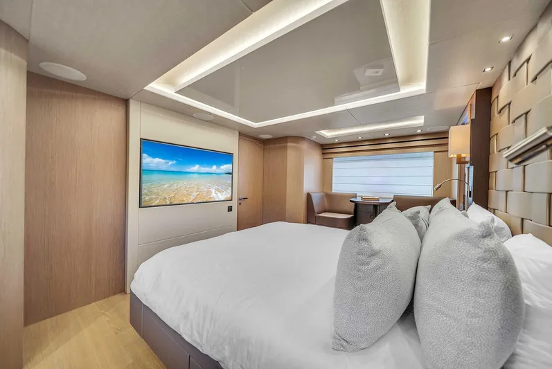  Yacht Photos Pics Luxurious Sunseeker 86 yacht bedroom interior, 2019 model, featuring modern design and large TV.