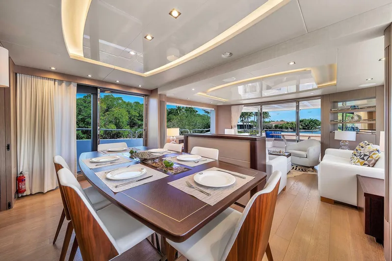  Yacht Photos Pics Luxurious interior of 2019 Sunseeker 86 yacht with elegant dining area and scenic views.