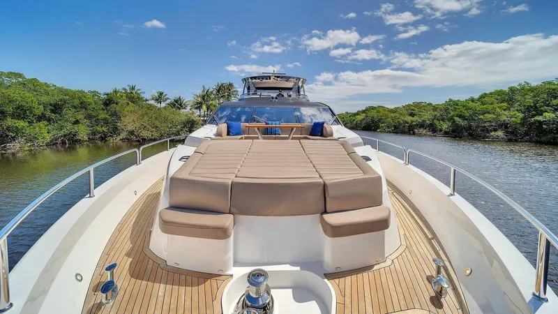  Yacht Photos Pics 2019 Sunseeker 86 yacht with spacious deck, cruising on a sunny day.