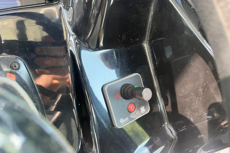  Yacht Photos Pics Control panel of a 2020 Jeanneau NC 895 boat with joystick and buttons.