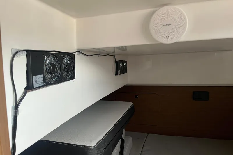  Yacht Photos Pics Interior of 2020 Jeanneau NC 895 boat cabin with ventilation system and speaker.