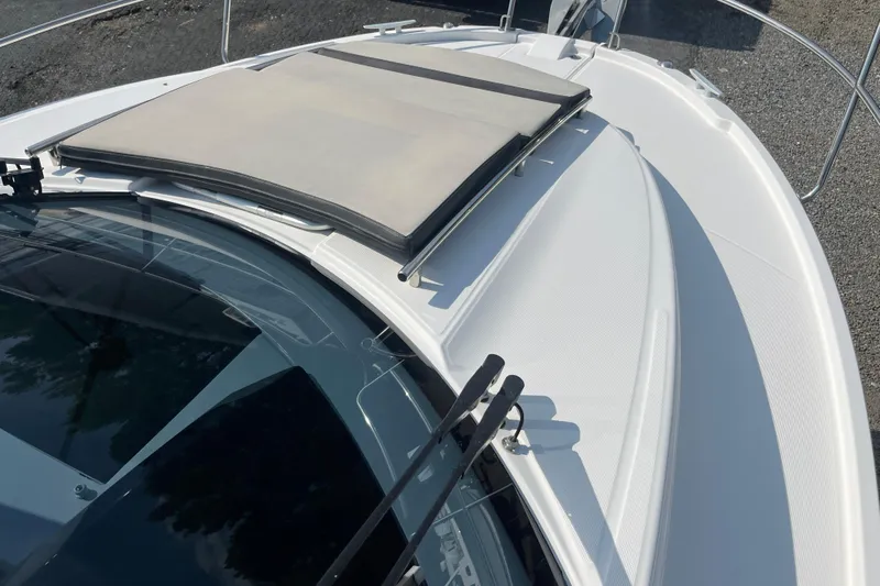  Yacht Photos Pics 2020 Jeanneau NC 895 boat deck with sunroof and sleek design.