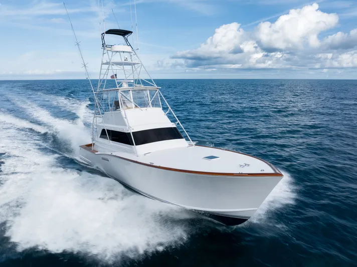 Smoke Show Yacht Photos Pics 1985 Monterey Convertible Yacht on open sea.