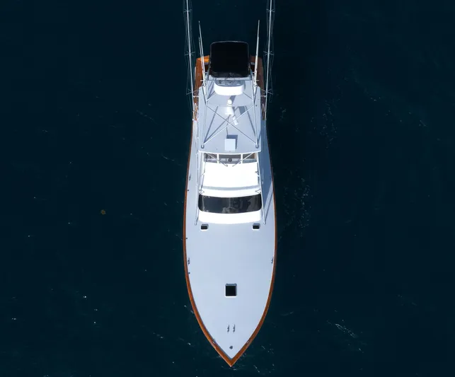Smoke Show Yacht Photos Pics Aerial view of a 1985 Monterey Convertible boat on the water.