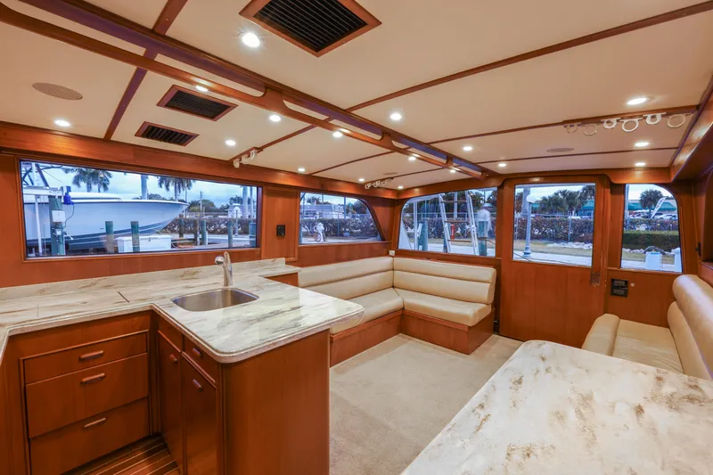Smoke Show Yacht Photos Pics Interior of a 1985 Monterey Convertible boat with luxurious furnishings.