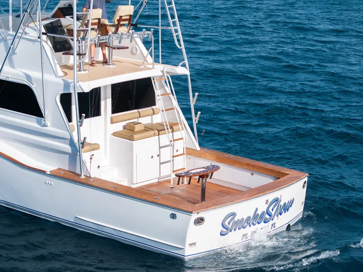 Smoke Show Yacht Photos Pics 1985 Monterey Convertible Yacht on open sea.