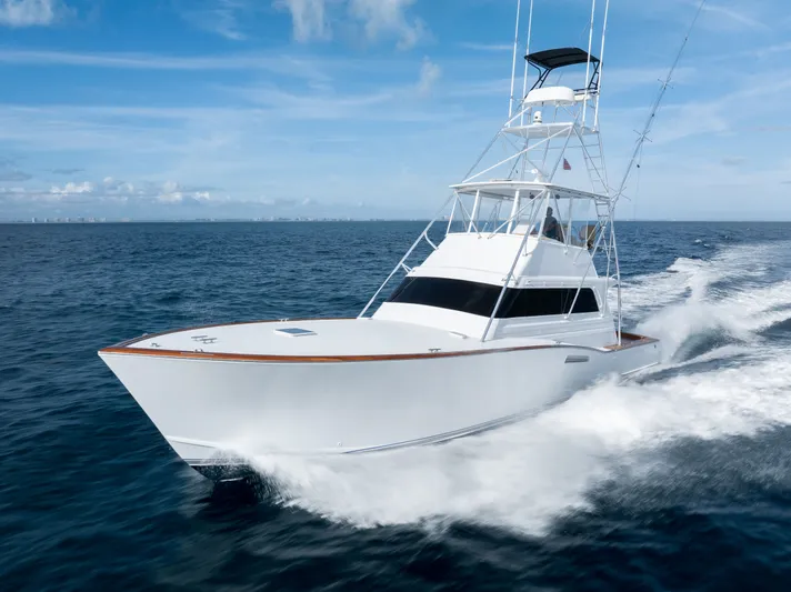 Smoke Show Yacht Photos Pics 1985 Monterey Convertible Yacht on open sea.