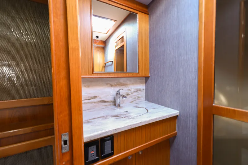 Smoke Show Yacht Photos Pics Luxurious bathroom in 1985 Monterey Convertible boat.
