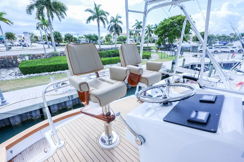 Smoke Show Yacht Photos Pics Luxurious helm of a 1985 Monterey Convertible boat.