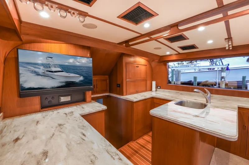 Smoke Show Yacht Photos Pics Luxurious interior of a 1985 Monterey Convertible yacht.