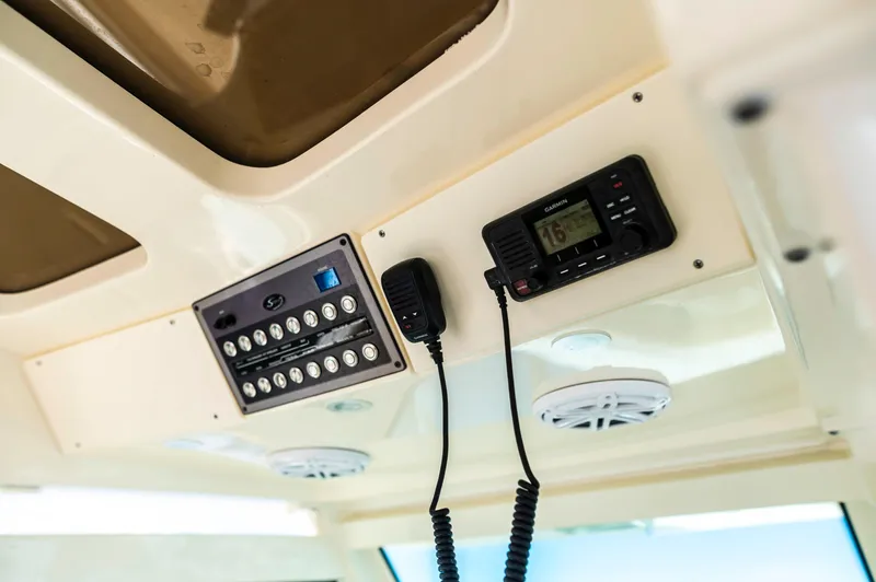  Yacht Photos Pics 2019 Scout 355 LXF boat dashboard with radio and control panel.