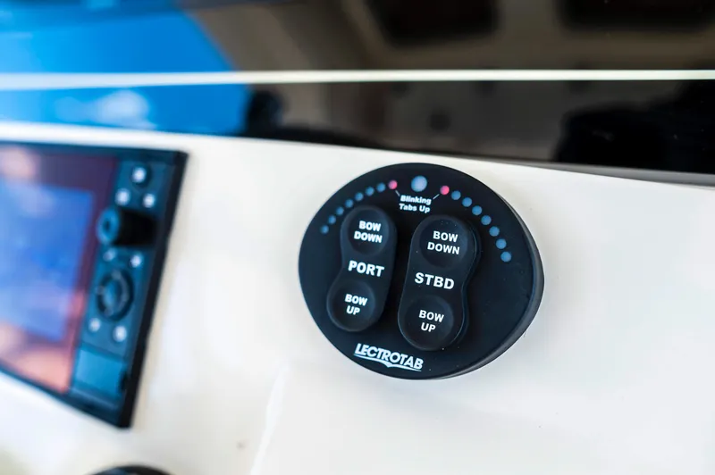  Yacht Photos Pics Control panel on 2019 Scout 355 LXF boat featuring Lectrotab trim tab switches.