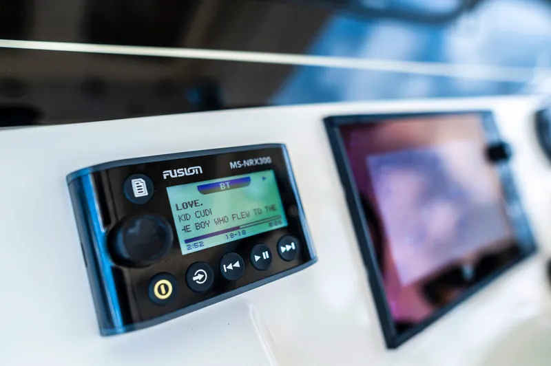  Yacht Photos Pics Fusion MS-NRX300 stereo system on 2019 Scout 355 LXF boat dashboard.