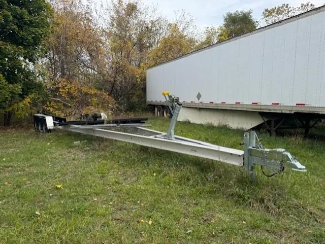  Yacht Photos Pics Trailer for 2019 Scout 355 LXF boat on grassy field.