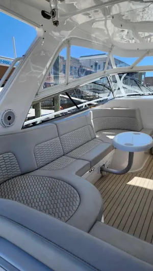 No Ultimatum Yacht Photos Pics Interior of 2020 Intrepid 475 Sport Yacht with luxurious seating and table.
