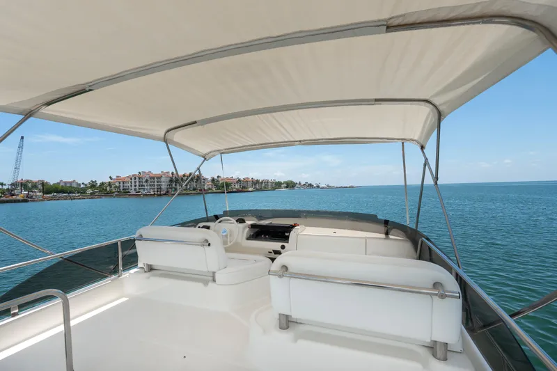  Yacht Photos Pics Flybridge view of 1998 Azimut 43 Fly yacht on calm waters.