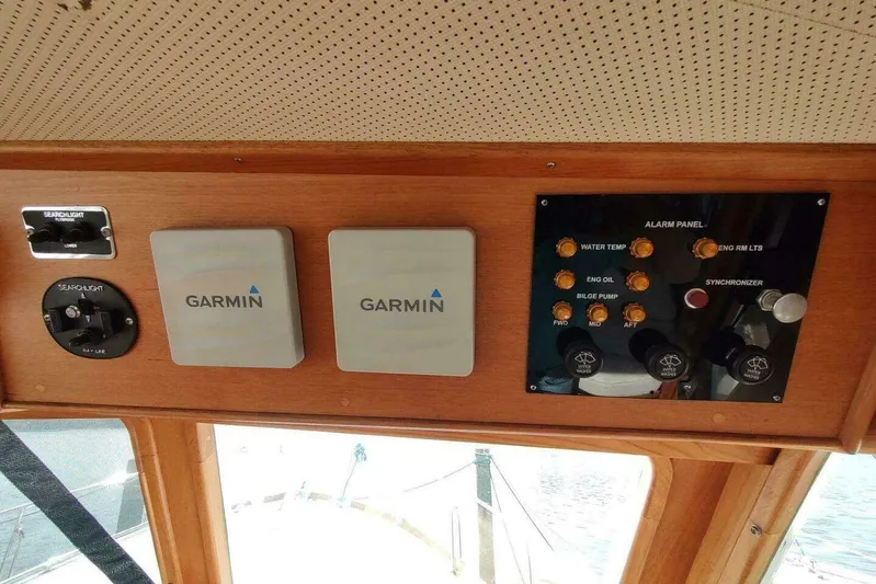 Summersalts Yacht Photos Pics Control panel of a 1996 Grand Banks Eastbay 40 Flybridge with Garmin devices.