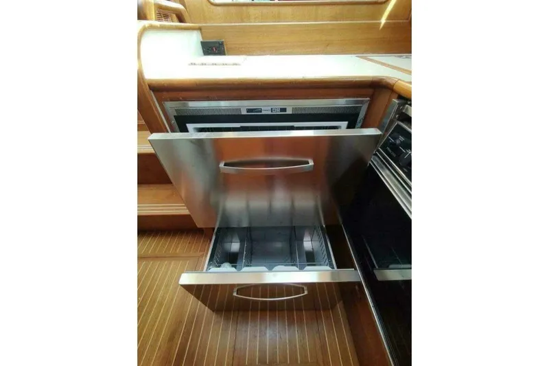Summersalts Yacht Photos Pics Stainless steel drawer in 1996 Grand Banks Eastbay 40 Flybridge yacht kitchen.