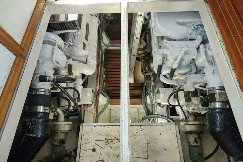 Summersalts Yacht Photos Pics Engine room of 1996 Grand Banks Eastbay 40 Flybridge with dual engines and mechanical components.