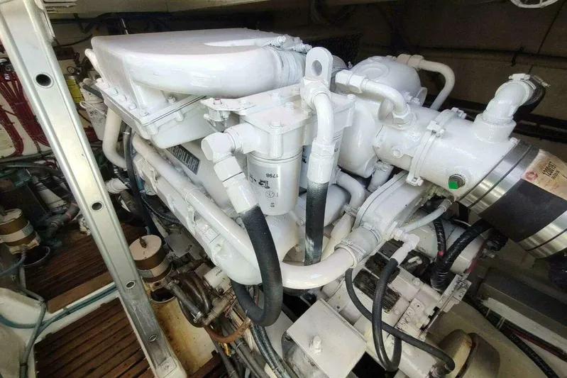 Summersalts Yacht Photos Pics Engine room of 1996 Grand Banks Eastbay 40 Flybridge, showcasing detailed machinery components.