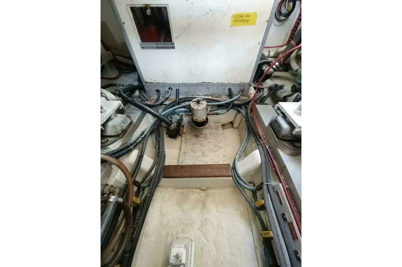 Summersalts Yacht Photos Pics Engine room of 1996 Grand Banks Eastbay 40 Flybridge with visible wiring and components.