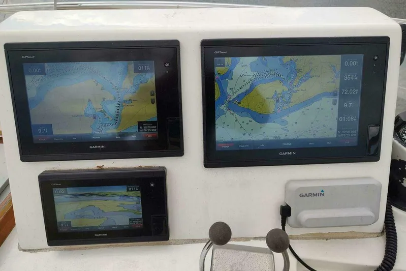 Summersalts Yacht Photos Pics Garmin navigation displays on 1996 Grand Banks Eastbay 40 Flybridge boat dashboard.