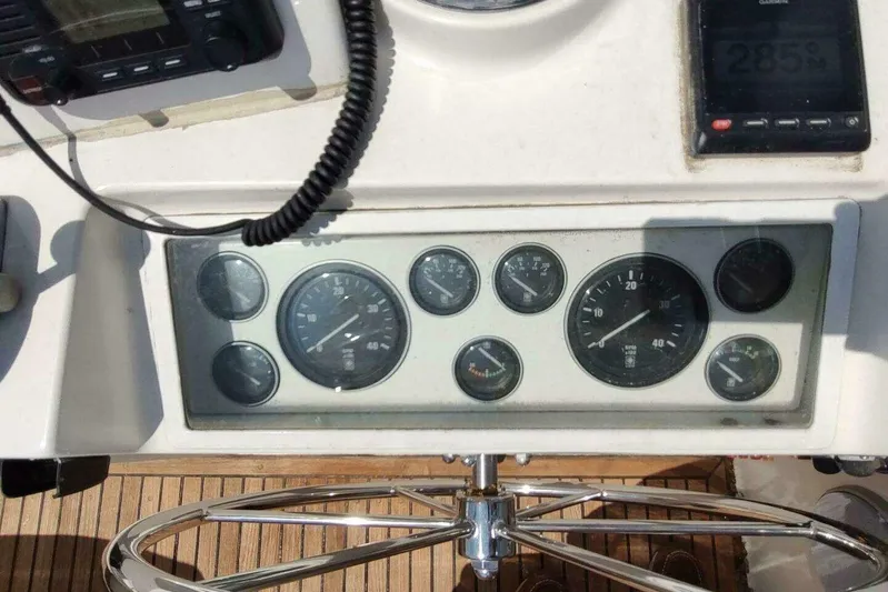 Summersalts Yacht Photos Pics 1996 Grand Banks Eastbay 40 Flybridge dashboard with gauges and controls.