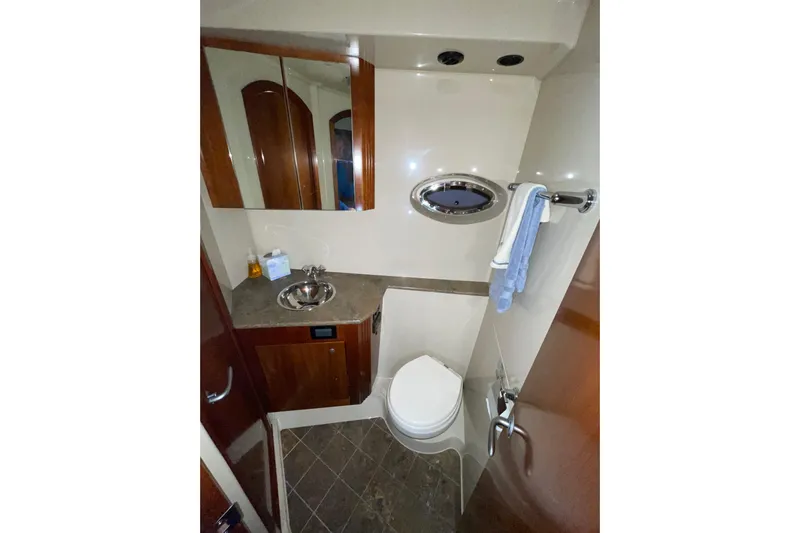 Yacht Photos Pics Luxurious bathroom in 2008 CRUISERS INC 415 Express Motoryacht with modern fixtures.