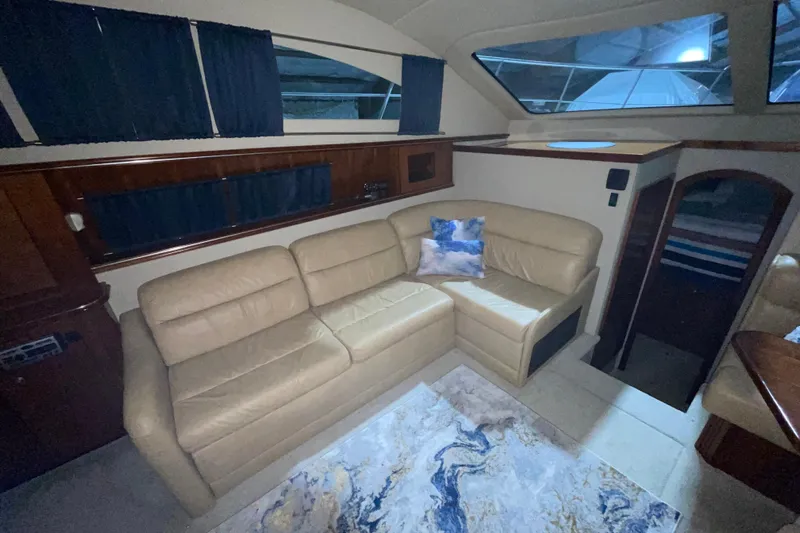  Yacht Photos Pics Luxurious interior of 2008 CRUISERS INC 415 Express Motoryacht with beige leather seating.