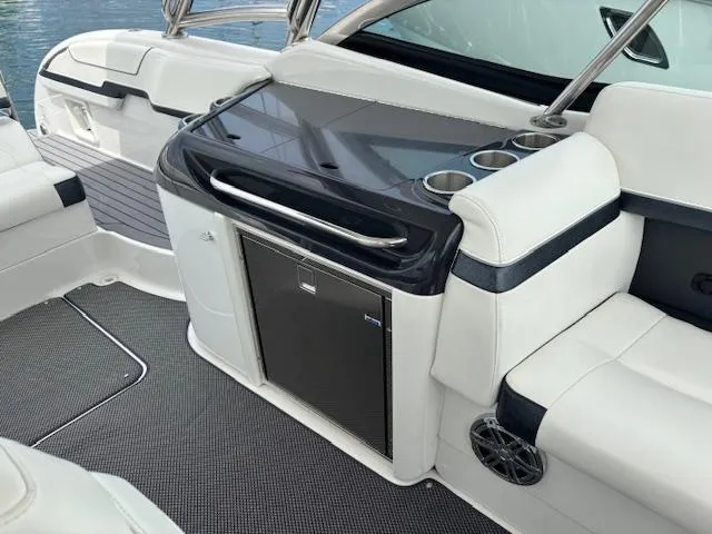  Yacht Photos Pics 2017 Formula 350 CBR boat interior with seating, mini fridge, and cup holders.