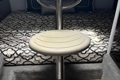  Yacht Photos Pics 2017 Formula 350 CBR cabin interior with patterned bedding and a central seat.