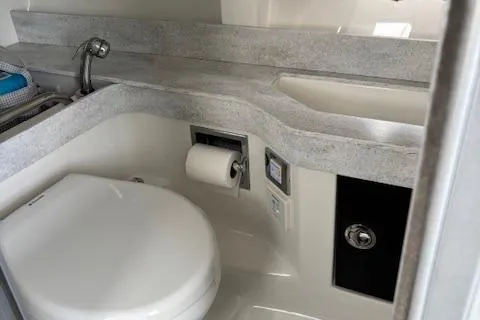  Yacht Photos Pics 2017 Formula 350 CBR boat bathroom with modern fixtures and sleek countertop design.