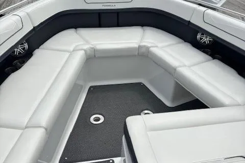  Yacht Photos Pics 2017 Formula 350 CBR boat interior with white cushioned seating and black flooring.