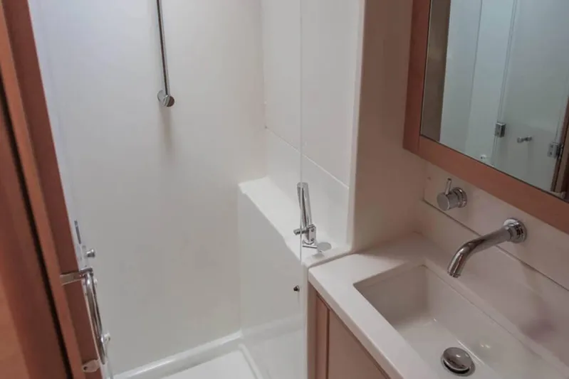  Yacht Photos Pics Bathroom interior of 2018 Lagoon 450 F yacht, featuring modern sink and shower.