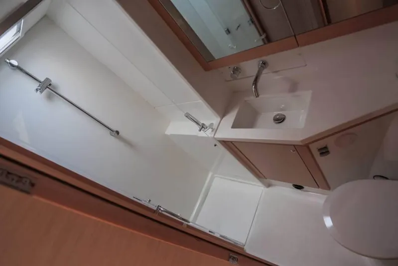  Yacht Photos Pics Bathroom interior of 2018 Lagoon 450 F yacht, featuring shower and sink.