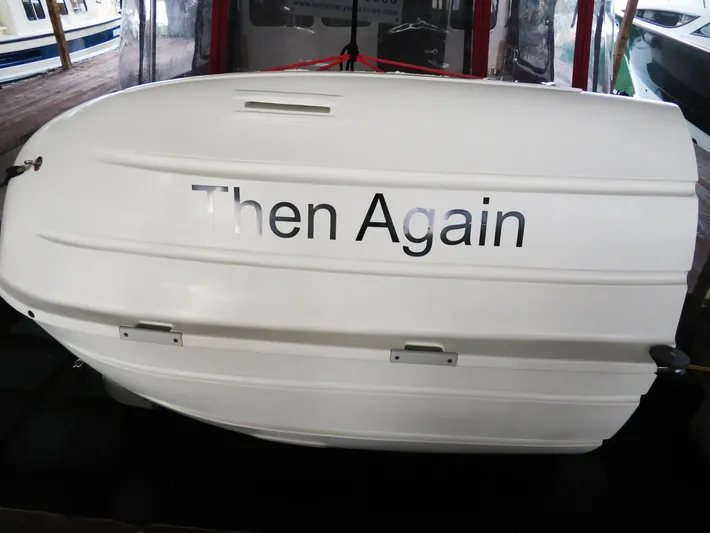 Then Again Yacht Photos Pics 2018 Ranger Tugs R-31 S boat with "Then Again" text on the side.