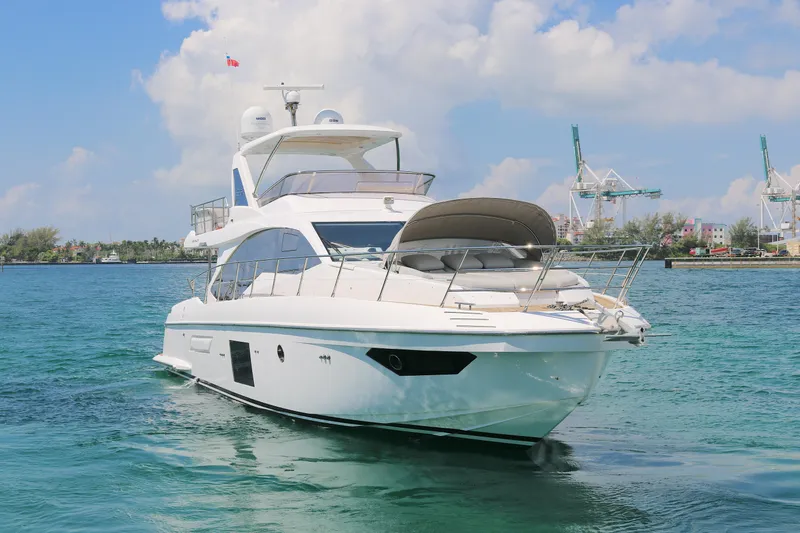 Bon Bon Yacht Photos Pics Luxury 2020 Azimut 55 yacht cruising in clear blue waters.