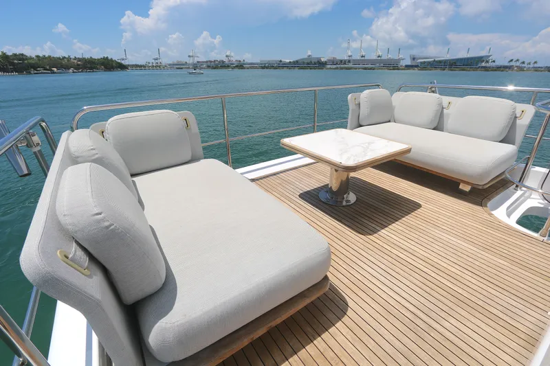 Bon Bon Yacht Photos Pics Luxurious Azimut 55 yacht deck with plush seating and ocean view, 2020 model.