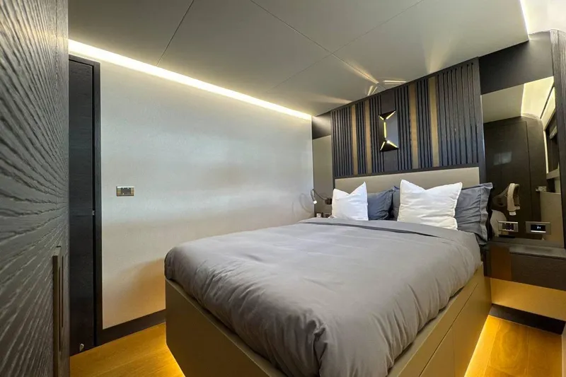 Maoria Yacht Photos Pics Luxurious bedroom interior of 2021 Numarine 26XP yacht with modern design elements.