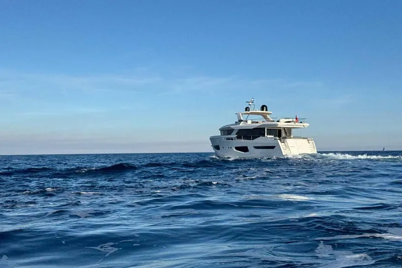 Maoria Yacht Photos Pics Luxury Numarine 26XP yacht cruising on open sea, 2021 model.