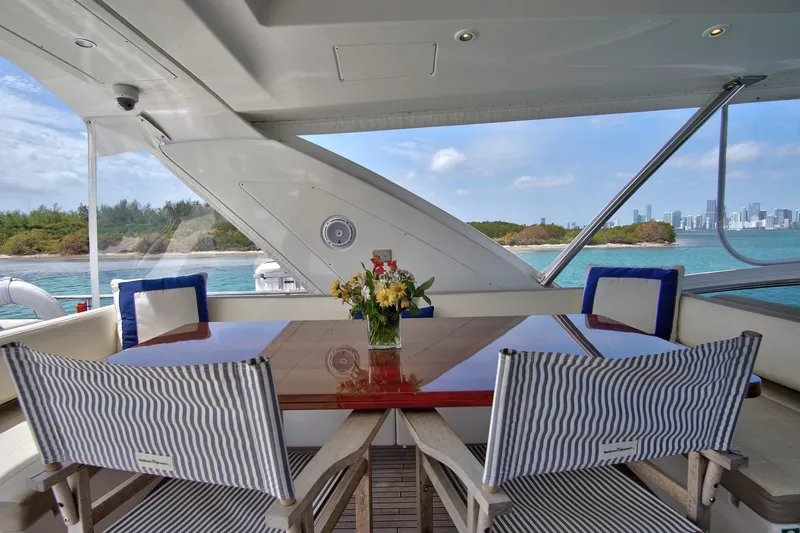 Gratitude Yacht Photos Pics Luxurious 2017 Azimut 72 Flybridge yacht with elegant dining area and scenic ocean view.