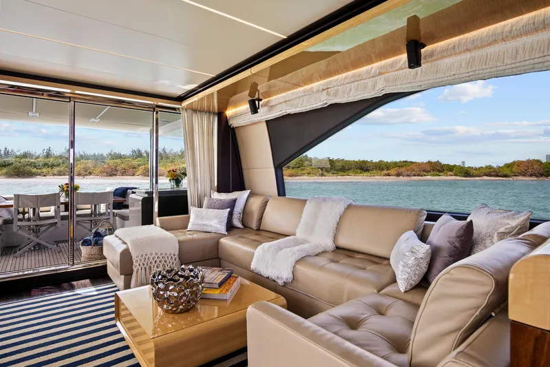 Gratitude Yacht Photos Pics Luxurious interior of 2017 Azimut 72 Flybridge yacht with elegant seating and scenic ocean view.