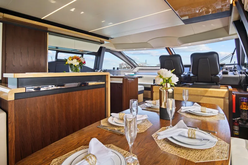 Gratitude Yacht Photos Pics Luxurious interior of 2017 Azimut 72 Flybridge yacht with elegant dining setup.