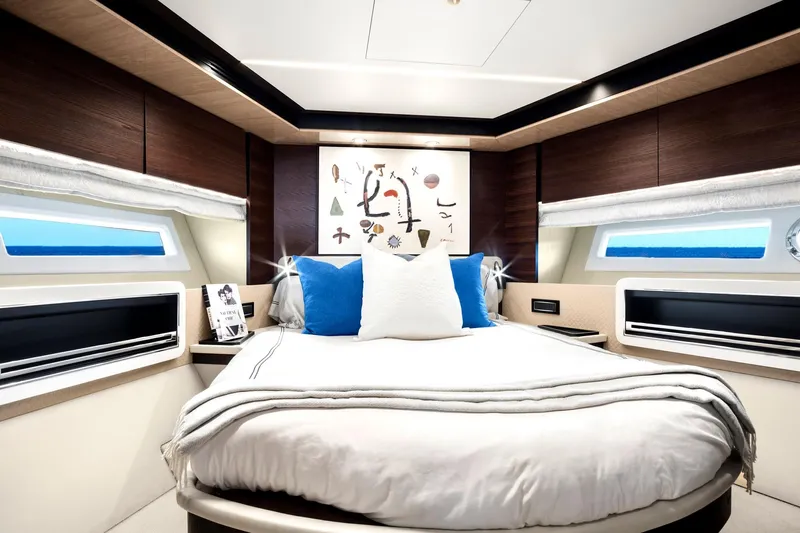 Gratitude Yacht Photos Pics Luxurious bedroom interior of 2017 Azimut 72 Flybridge yacht with modern decor and ocean view.