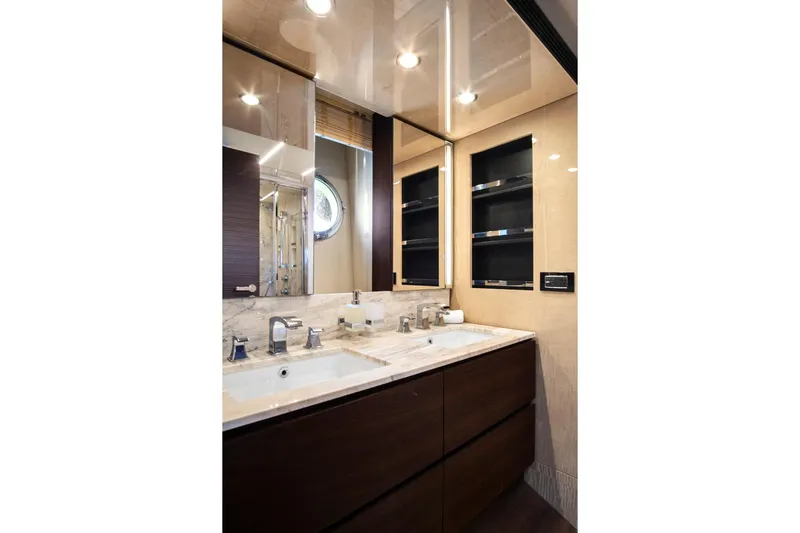 Gratitude Yacht Photos Pics Luxurious bathroom in 2017 Azimut 72 Flybridge yacht with dual sinks and elegant finishes.